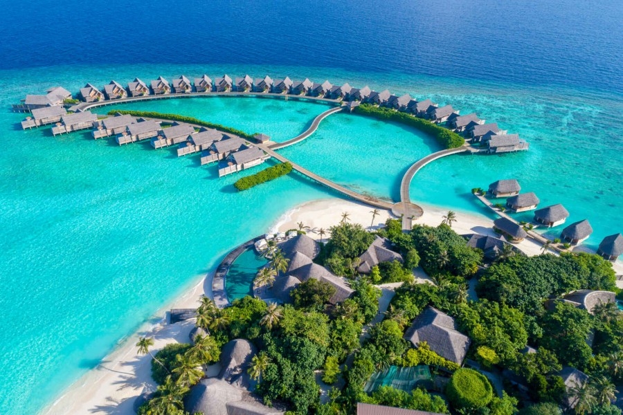 Tropical island resort surrounded by blue water